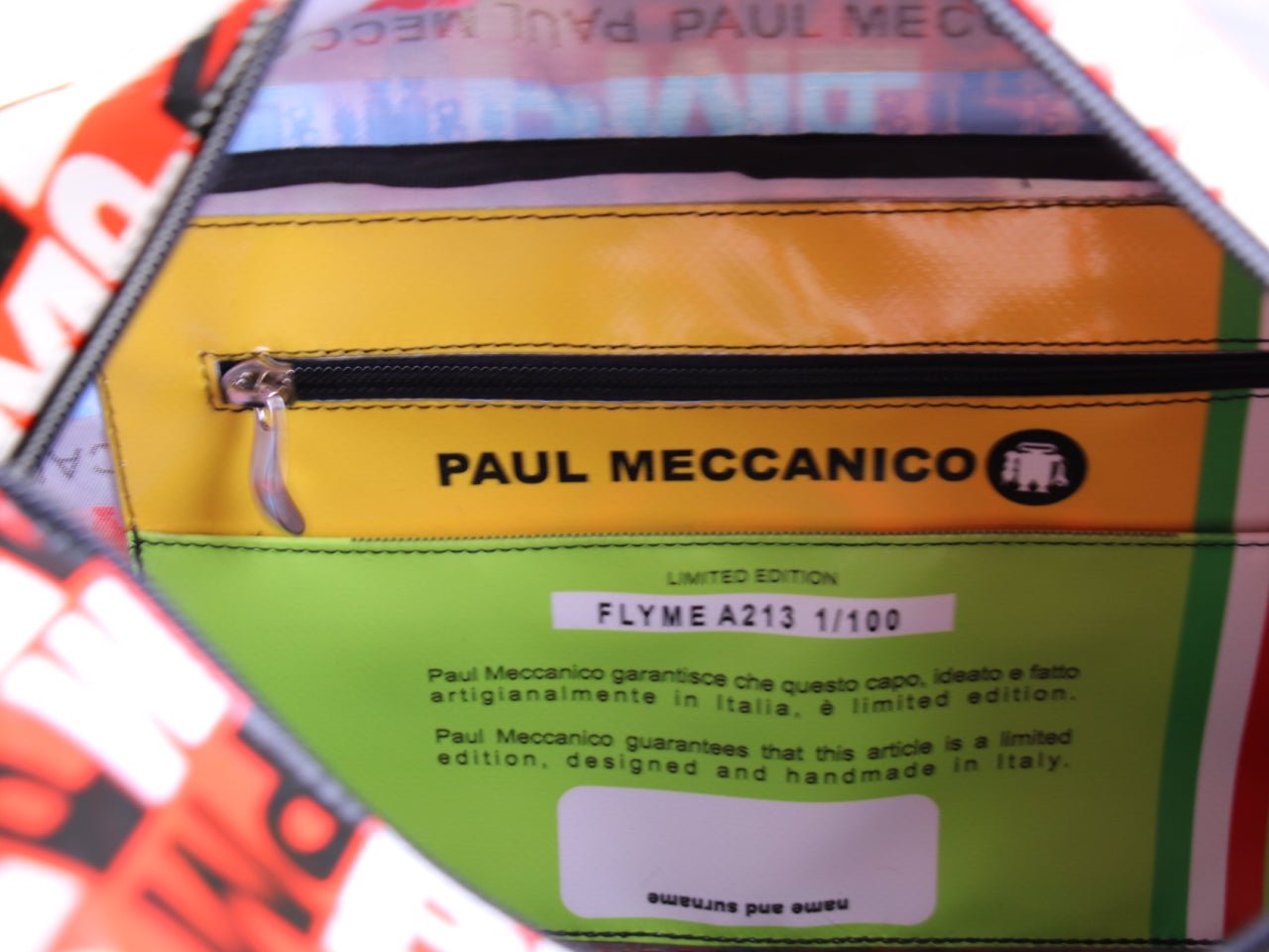 RED HAND LUGGAGE BAG WITH LETTERING FANTASY 40 X 20 X 25 CM. MODEL FLYME MADE OF LORRY TARPAULIN.